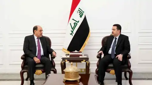 محمد شياع السوداني ونوري المالكي خلال لقاء سابق