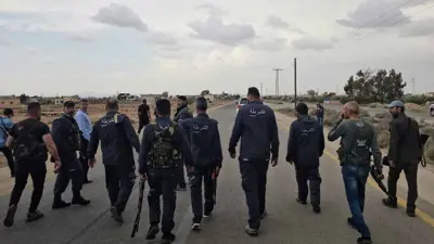 أفراد من شرطة السويداء أثناء انتشارهم في قرية