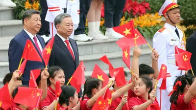 أمين الحزب الشيوعي الفيتنامي، تو لام، والرئيس الصيني شي جين بينغ