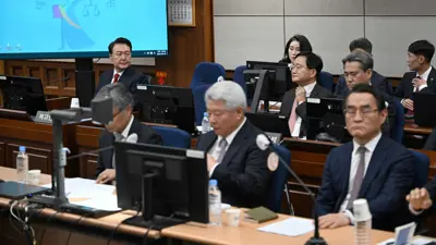 يون سوك يول خلال محاكمته بتهمة التمرد