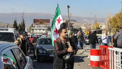 مشهد من الاحتفالات بسقوط الأسد في سوريا