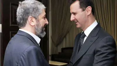 بشار الأسد والقيادي في حماس خالد مشعل