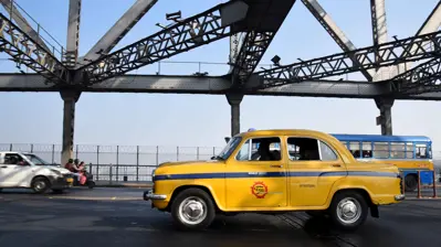 سائق سيارة أجرة في الهند (تعبيرية)