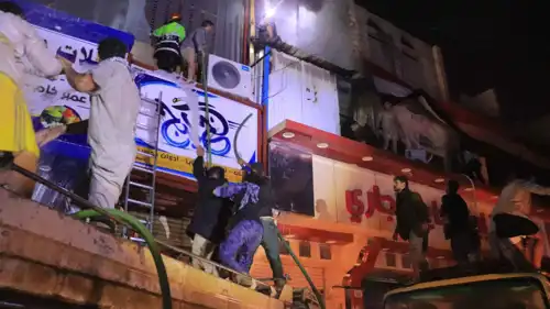 محاولات للسيطرة على الحريق وإنقاذ العالقين