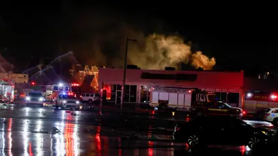 فرق الإطفاء تحاول السيطرة على الحرائق