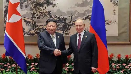 بوتين وكيم في لقاء سابق