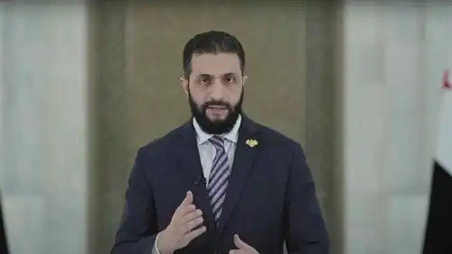 الشرع خلال إلقاء الكلمة