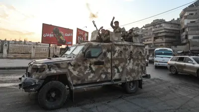 عناصر من الفصائل المسلحة في حماة