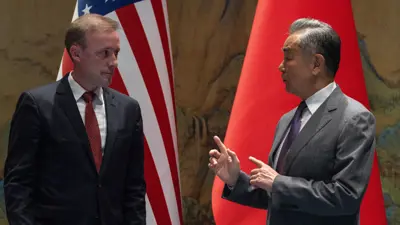 وزير الخارجية الصين ومشتشار الأمن القومي الأمريكي 