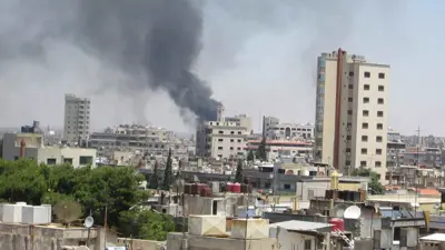 دخان يتصاعد في تلبيسة بمدينة حمص