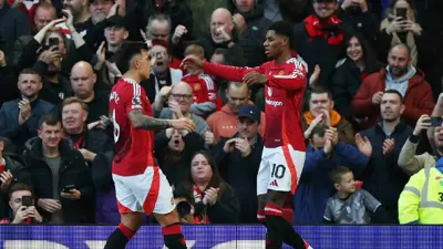 ماركوس راشفورد مع زميلة مارتينيز