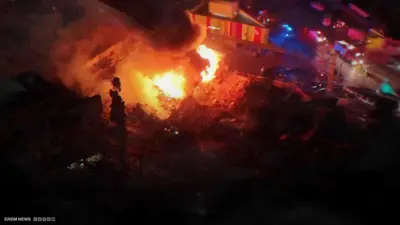 من موقع سقوط صاروخ إيراني في تل أبيب