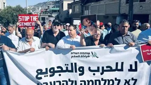 أيمن عودة خلال فعالية ضد الحرب على غزة