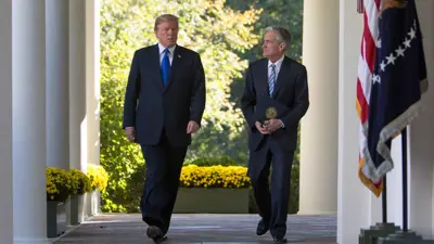 جيروم باول ودونالد ترامب