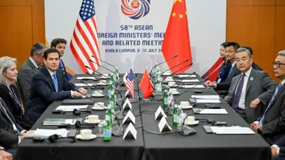 جانب من لقاء وزيري الخارجية الصيني والأمريكي