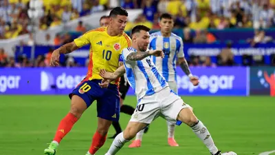 ليونيل ميسي وخاميس رودريغيز