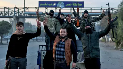 مسلحو الفصائل في حمص