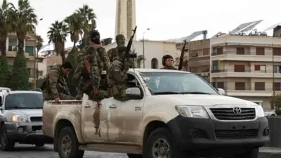 قوة أمنية تابعة لإدارة العلميات العسكرية في سوريا