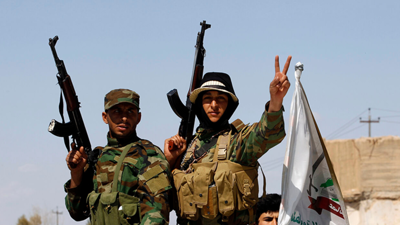 عنصران من الحشد الشعبي