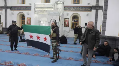 مسلحو المعارضة في أحد مساجد حمص