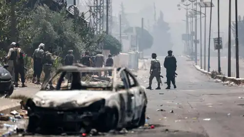 مسلحون من البدو خلال اقتحام السويداء