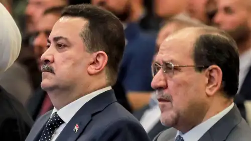 السوداني والمالكي في لقطة سابقة