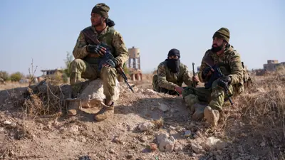 مسلحون على مشارف حماة