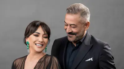 عبد المنعم عمايري وأمل عرفة 