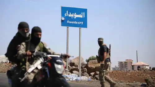 لافتة في محافظة السويداء السورية