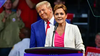 ترامب وكاري ليك في تجمع انتخابي سابق