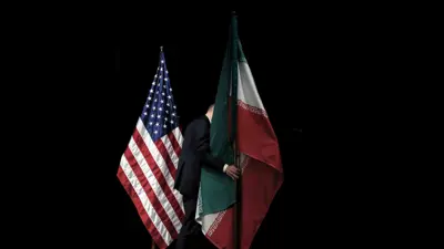 العلمان الإيراني والأمريكي