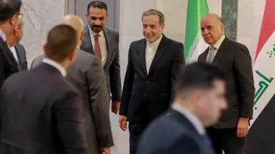 وزير الخارجية العراقي ونظيره الإيراني