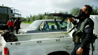 رجل أمن سوري في اللاذقية