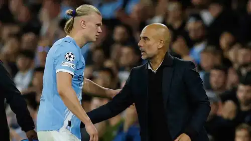 بيب غوارديولا مع هالاند