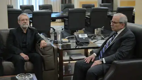 نواف سلام وعلي لاريجاني