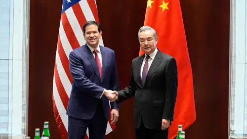 روبيو ونظيره الصيني خلال اللقاء