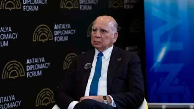 فؤاد حسين في مؤتمر أنطاليا