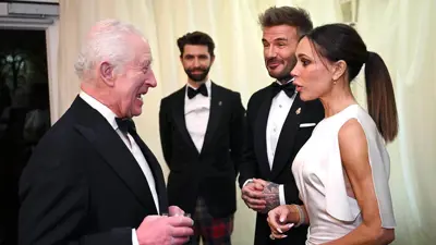 فيكتوريا وديفيد بيكهام برفقة الملك تشارلز