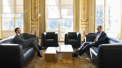 فريدريش ميرتس إيمانويل ماكرون