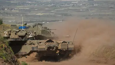 آليات عسكرية إسرائيلية في المنطقة العازلة