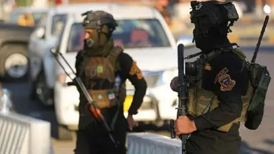 عنصران من الأمن العراقي