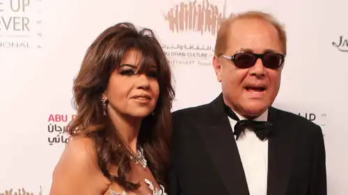 الفنان الراحل محمود عبد العزيز والإعلامية بوسي شلبي