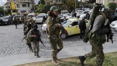 عناصر تابعون للفصائل المسلحة في سوريا