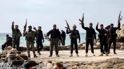 قوات أمن موالية للحكومة السورية في الساحل السوري 