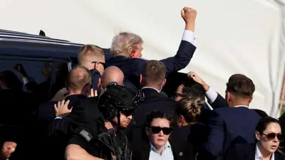 حراسات أمنية تنقل الرئيس الأمريكي السابق دونالد ترامب من موقع محاولة الاغتيال