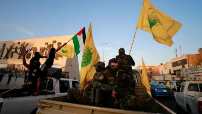 عناصر من ميليشيا النجباء العراقية في بغداد