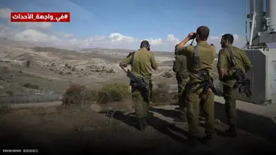 قوات إسرائيلية بالقرب من سياج حدودي بين الجانب الإسرائيلي من مرتفعات الجولان وسوريا