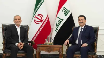 رئيس الوزراء العراقي مستقبلًا الرئيس الإيراني