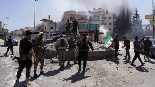 مقاتلون تابعون لوزارة الدفاع السورية في السويداء