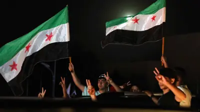 من احتفالات السوريين بقرار ترامب